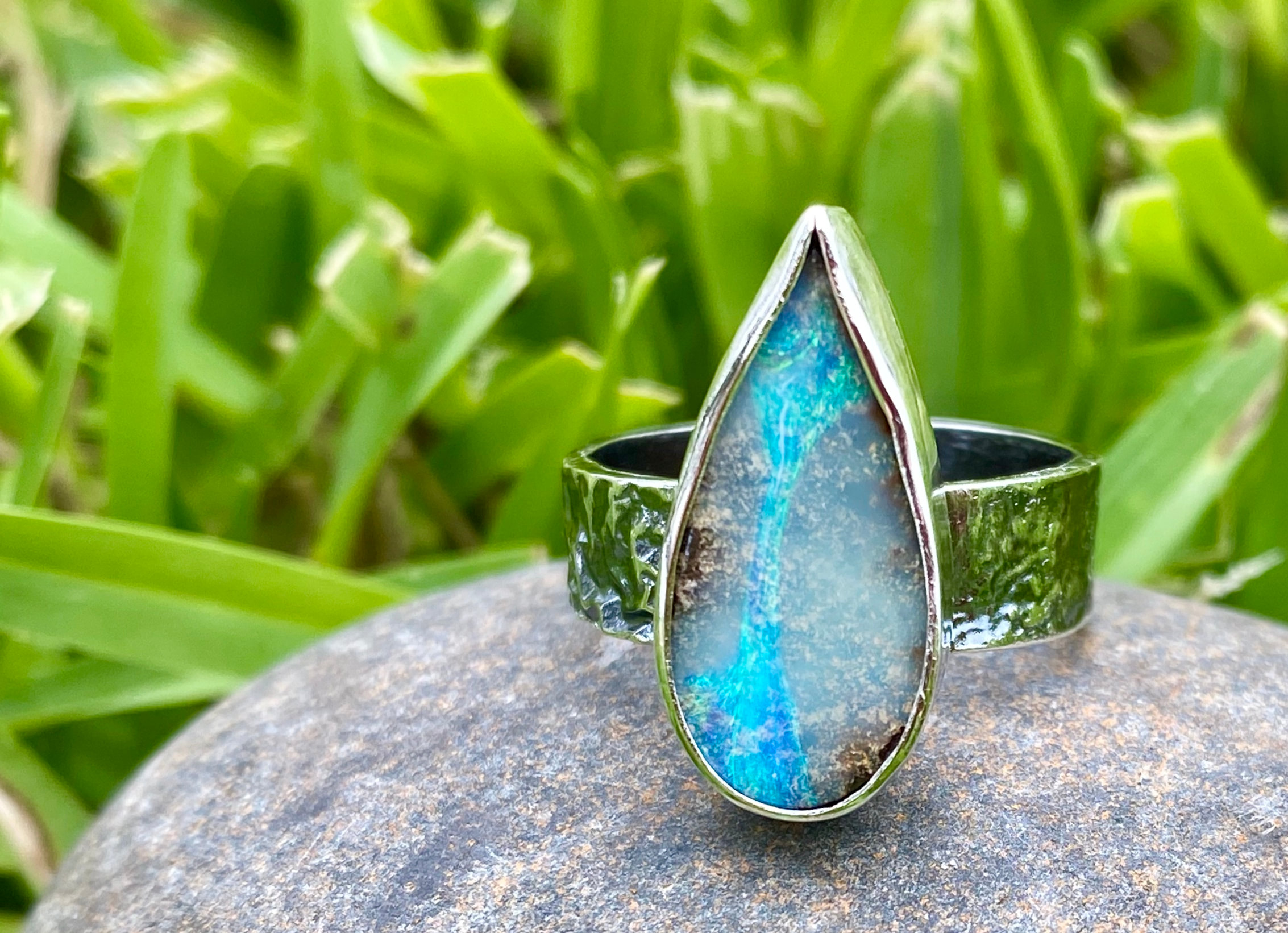 Wide band Australian Boulder Opal ring in reticulated silver